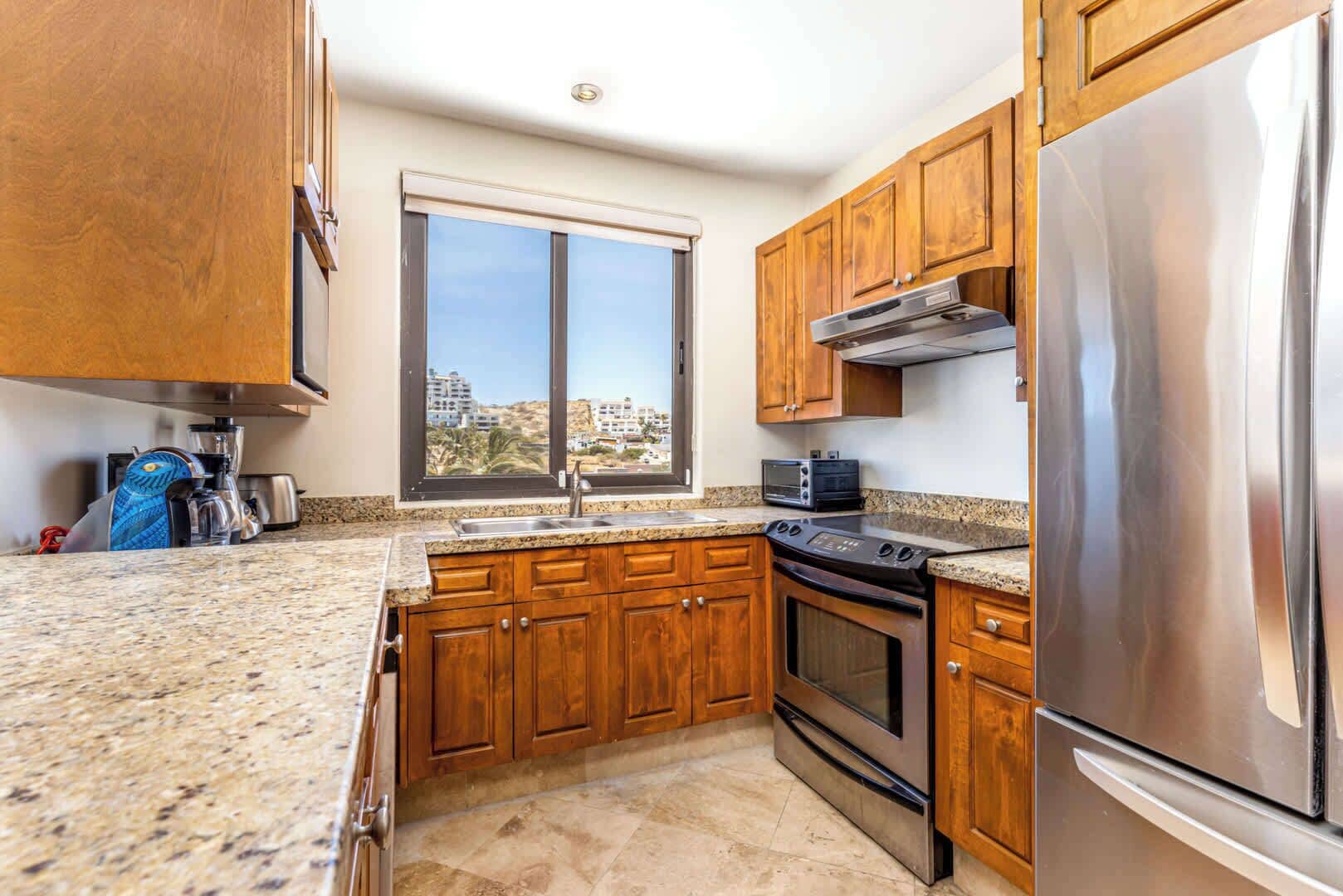 Apartamento, varias camas, patio, vistas al mar (Alegranza 101) | Cocina privada | Cafetera o tetera y mesa de comedor