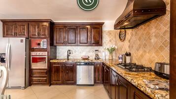 Apartment, Multiple Beds, Balcony, Ocean View (Hacienda Encantada 2711) | Private kitchen | Coffee/tea maker, dining tables