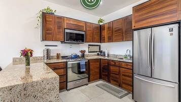 Apartment, Multiple Beds, Balcony, Ocean View (HD3-202) | Private kitchen | Coffee/tea maker, dining tables