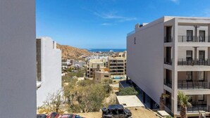 Apartment, Multiple Beds, Balcony, Ocean View (HD3-202) | Exterior - Amazing 2BR Condo With Rooftop Pool - BBQ (Cabo San Lucas)