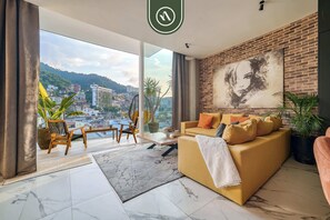 Leilighet, 1 kingsize-seng med sovesofa, kjøkken, strandutsikt (Avida 616 Casa Magnífica) | Oppholdsområde | En 42-tommers Flatskjerm-TV med digitale kanaler