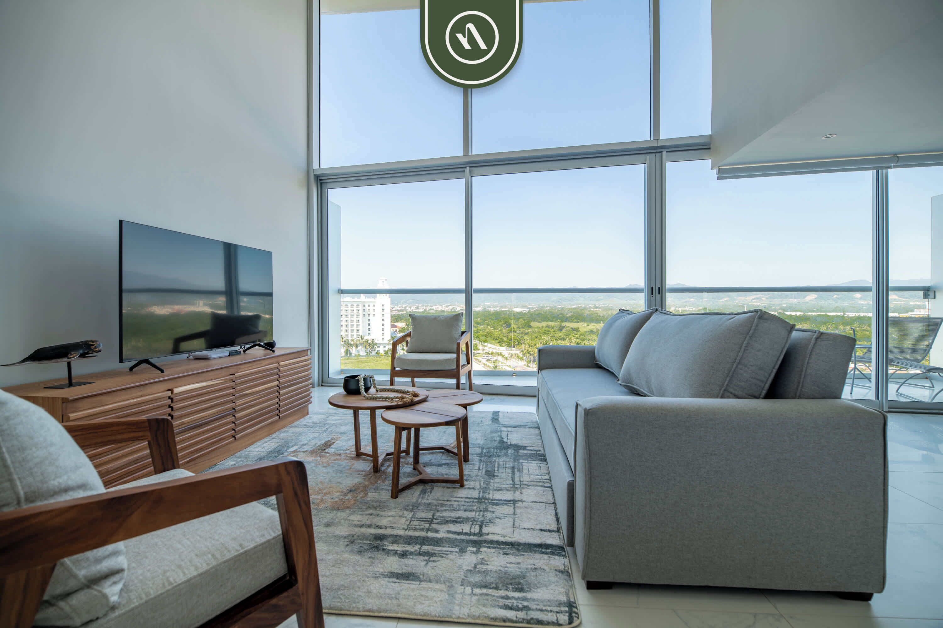 Departamento, varias camas, cocina, vista al océano (Maritima Playa 9R) | Área de sala de estar | Televisión de pantalla plana de 42 pulgadas con canales digitales 