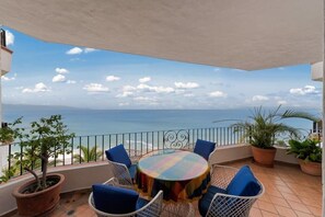 Apartment, Multiple Beds, Kitchen, Ocean View (710-VistadelSol) | Outdoor dining