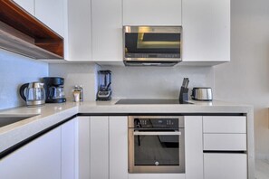 Departamento, 2 camas Queen size, cocina, vista al océano (Madero 320 306) | Cocina privada | Cafetera y tetera y comedor