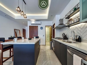 Condo, Multiple Beds, Pool Access, Mountain View (Esquina Versalles 204) | Private kitchen | Dining tables - Amazing 2 BR Condo in Versalles - Rooftop Pool (Puerto Vallarta)