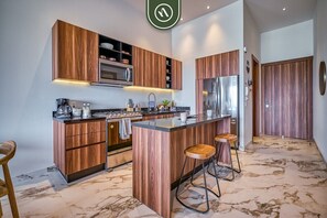 Departamento, varias camas, balcón, vista al océano (DToscana PH02 - Torre Sienna) | Cocina privada