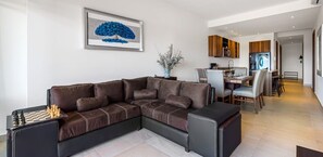 Apartment, Multiple Beds, Kitchen, Beach View (DToscana 501) | Living area | 42-inch flat-screen TV with digital channels - Equipped 3BR House - Pool - Gym - 5 min to Beach (Nuevo Nayarit)