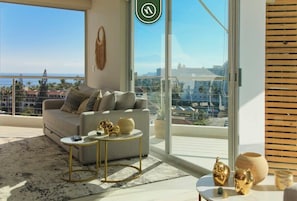 Appartement, 2 tweepersoonsbedden, keuken, uitzicht op oceaan (Aria Ocean T1 702) | Woonruimte | Een 42-inch flatscreentelevisie met digitale zenders