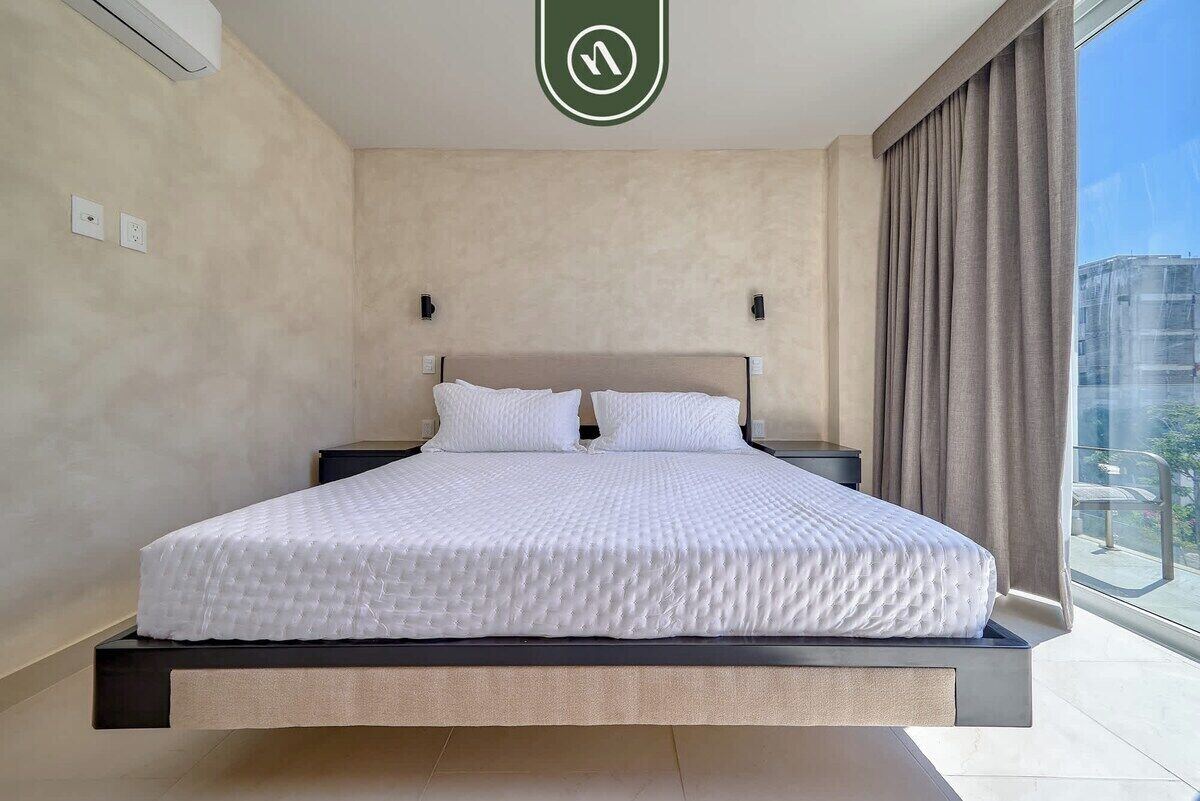 Apartamento, várias camas, sacada, vista para a praia (Ki Green T200 C304) | 2 quartos, individualmente decorados, individualmente mobiliados