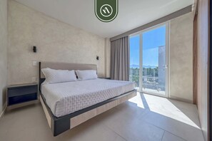 Apartment, Multiple Beds, Kitchen, Beach View (Ki Green T200 C304) | 2 bedrooms, individually decorated, individually furnished, bed sheets - Luxury 2 BR Condo Near Beaches - Pools - Gym (Nuevo Nayarit)