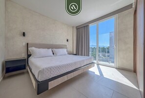 Apartemen, Beberapa Tempat Tidur, balkon, pemandangan pantai (Ki Green T200 C304) | 2 kamar tidur dan didekorasi berbeda-beda