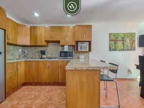 Apartment, Multiple Beds, Pool Access, Beach View (Aria Ocean T1 124) | Private kitchen | Coffee/tea maker, dining tables