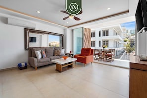 Apartment, Multiple Beds, Kitchen, Ocean View (The Park 406) | Living area | 42-inch flat-screen TV with digital channels