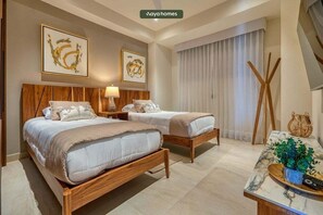 Apartment, Multiple Beds, Pool Access, Beach View (DToscana 411 Pisa) | 2 bedrooms, individually decorated, individually furnished, bed sheets