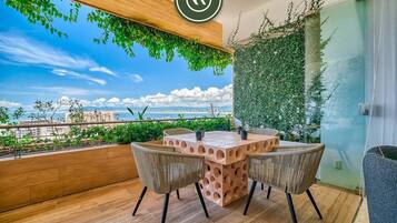 Appartamento, 1 letto king con divano letto, idromassaggio, vista oceano (Soho PV 705) | Ristorazione all'aperto