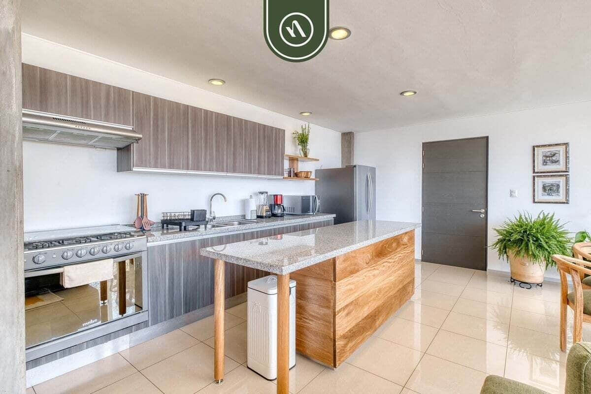Apartment, Mehrere Betten, Balkon, Stadtblick (Condominio Olimpo A2) | Eigene Küche