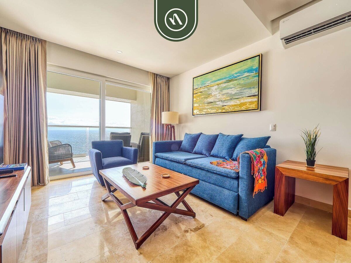 Condo, 1 cama King size y sofá cama, balcón, vista al océano (Harbor 171 Unit 1009) | Área de sala de estar