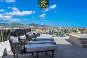 Apartment, Multiple Beds, Kitchen, Partial Ocean View (605 Tower-202/01 Lock-off) | Terrace/patio