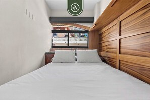 Condo, Multiple Beds, Pool Access, Pool View (Bliss 450 2 - 5) | 2 bedrooms, individually decorated, individually furnished, bed sheets - Restored Historic 2 BR Condo in Downtown - Pool (Puerto Vallarta)