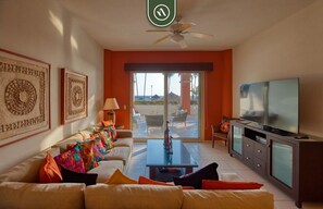 Condo, Multiple Beds, Pool Access, Ocean View (Playa Royale T1 1134) | Living area | 42-inch flat-screen TV with digital channels