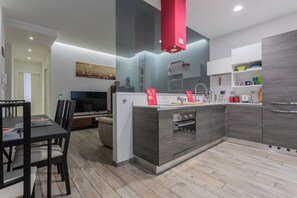 Apartment, 1 Double Bed, Balcony | Private kitchen | Fridge, oven, stovetop, dishwasher