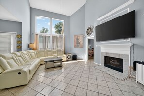 Smart TV, fireplace, books