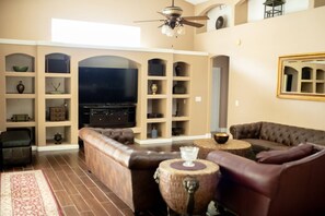 Smart TV, fireplace, DVD player, books