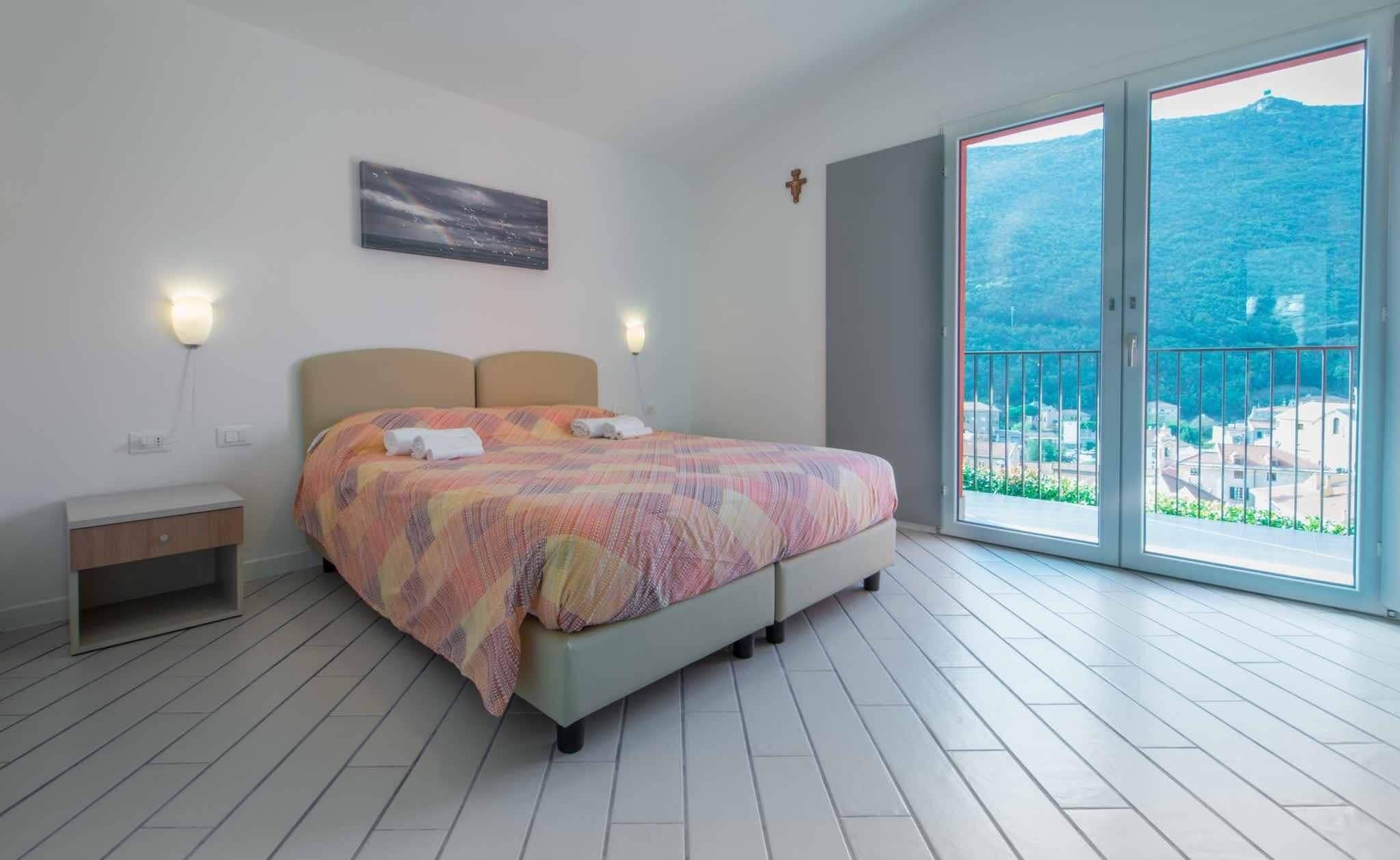 Appartamento in villa con piscina e terrazza panoramica | 遮光カーテン、アイロン / アイロン台、ベビーベッド (無料)、WiFi (無料)