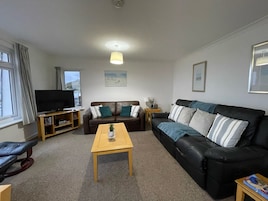 Apartment, 2 Bedrooms | Living area | 32-inch TV with digital channels, DVD player