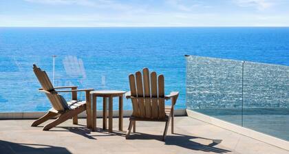 Distinguished Oceanfront Point Estate with Iconic Beach + Mountain Vistas