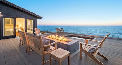 Distinguished Oceanfront Point Estate with Iconic Beach + Mountain Vistas