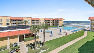 Condo, Multiple Beds (Point East 320) | Pool | A heated pool