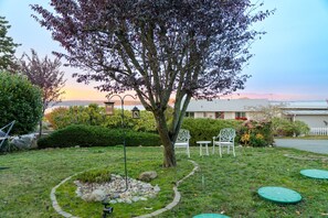 Property grounds - Cozy Garden 4BR/1BA Lower Unit w/ Ocean Views (Oak Harbor)