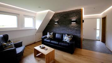 Télévision, lecteur de DVD, table de tennis de table, chaßne hi-fi