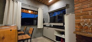 Fridge, microwave, coffee/tea maker, cookware/dishes/utensils