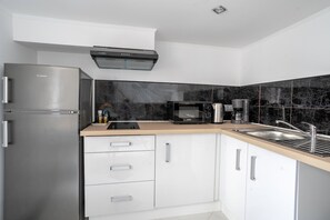 Fridge, microwave, coffee/tea maker, toaster