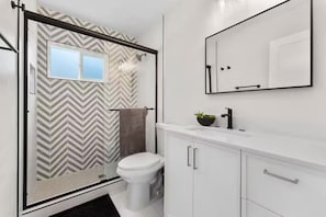 Shower, hair dryer, towels, soap
