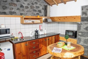 Villa, Courtyard View, Garden Area | Private kitchen | Fridge, microwave, oven, stovetop