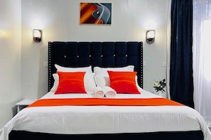 Deluxe Room, 1 King Bed, Private Bathroom | Iron/ironing board, free WiFi
