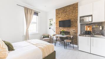 Tabla de planchar con plancha, Internet, ropa de cama