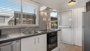 Fridge, microwave, dishwasher, coffee/tea maker