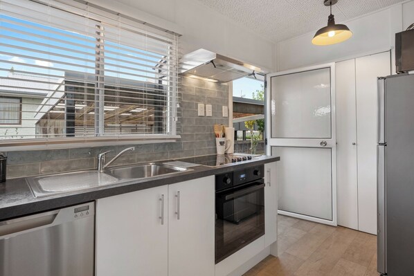 Fridge, microwave, dishwasher, coffee/tea maker