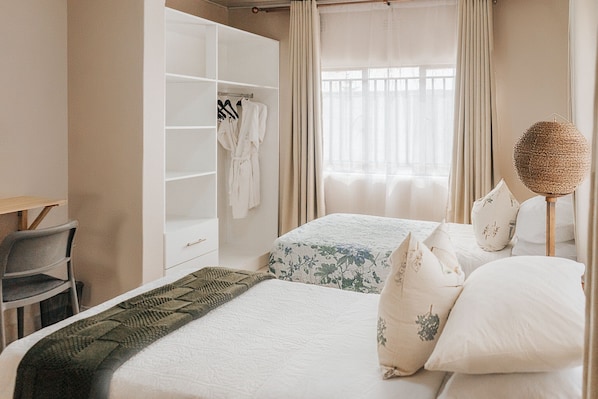 2 dormitorios, tabla de planchar con plancha, wifi y ropa de cama