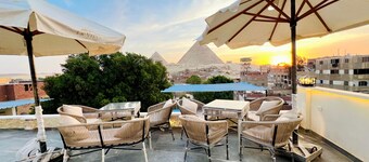 Vysta pyramids hotel Cairo 
View pyramids 
renovated rooms
Restaurant with view