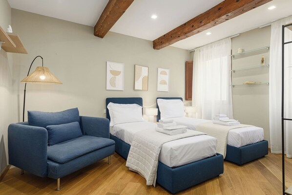 3 bedrooms, desk, iron/ironing board, travel crib