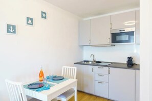 Fridge, microwave, stovetop, electric kettle