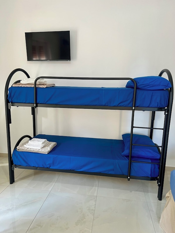 1 bedroom, travel crib, bed sheets