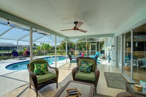 Outdoor pool, a heated pool - Hot Tub + Heated Pool, Gulf Access, Waterfront with Lanai TV (Cape Coral)