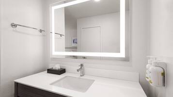 Eco-friendly toiletries, hair dryer, towels, soap