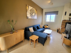 Villa, Sea View | Living area | 40-inch Smart TV with cable channels, DVD player, iPod dock - Aegean Helios Houses (Rhodes)